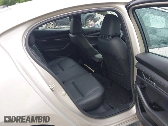 2024 Mazda 3 S Select Sport with VIN 3MZBPABM0RM403431, listed as a IAAI auction lot 42366921 with Not provided miles and . Bid and sale history available at DreamBid. Image 8.
