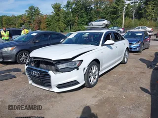 2017 Audi A6 Premium Plus with VIN WAUG8AFC6HN074016, listed as a IAAI auction lot 40417161 with 126,388 mi miles. Bid and sale history available at carsss.com. Image 2.