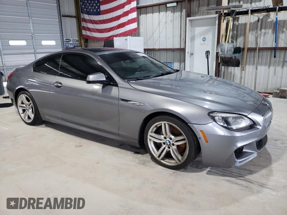 2015 BMW 6 Series 650i xDrive z VIN WBAYM1C53FD325311, wystawiony jako Copart lot #59563355 z przebiegiem 157 675 mil mil oraz Czysty tytuł • Clean title. Historia ofert i sprzedaży dostępna na DreamBid. Obrazek 4.