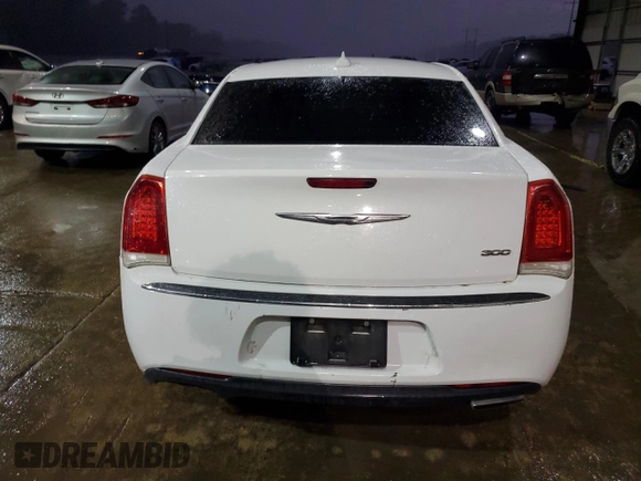 2015 Chrysler 300 Limited with VIN 2C3CCAAG5FH820184, listed as a Copart auction lot 84105134 with 210,459 mi miles and Salvage Title. Bid and sale history available at carsss.com. Image 6.