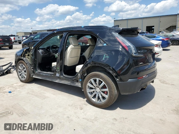 2021 Cadillac XT4 AWD Sport with VIN 1GYFZFR43MF054379, listed as a Copart auction lot 55338315 with 53,693 mi miles and Salvage title. Bid and sale history available at DreamBid. Image 2.