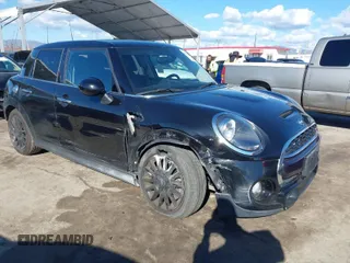 2019 MINI Hardtop 4 Door Cooper S with VIN WMWXU3C58K2H88917, listed as a IAAI auction lot 41750484 with 49,455 mi miles and . Bid and sale history available at DreamBid. Image 1.