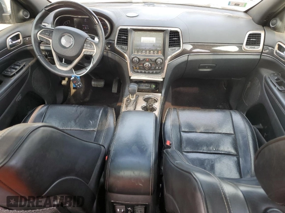 2017 Jeep Grand Cherokee Overland with VIN 1C4RJFCG0HC762612, listed as a Copart auction lot 57400095 with 122,702 mi miles and Salvage title. Bid and sale history available at DreamBid. Image 8.