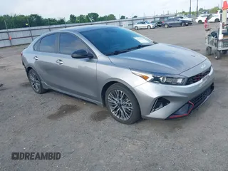 2023 Kia Forte GT-Line z VIN 3KPF54ADXPE665459, wystawiony jako IAAI lot #42102849 z przebiegiem 31 554 mil mil oraz . Historia ofert i sprzedaży dostępna na DreamBid. Obrazek 1.