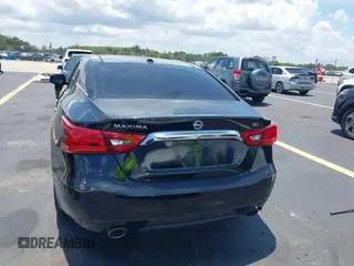 2016 Nissan Maxima S z VIN 1N4AA6AP3GC434993, wystawiony jako IAAI lot #42457183 z przebiegiem 100 569 mil mil oraz . Historia ofert i sprzedaży dostępna na DreamBid. Obrazek 16.