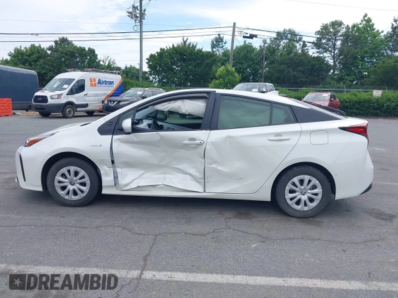 2019 Toyota Prius L Eco z VIN JTDKARFU3K3102222, wystawiony jako IAAI lot #42291403 z przebiegiem 27 669 mil mil oraz . Historia ofert i sprzedaży dostępna na DreamBid. Obrazek 13.