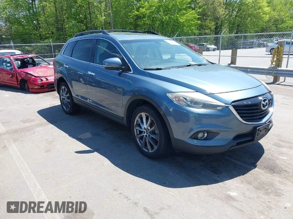 2015 Mazda CX-9 Grand Touring with VIN JM3TB3DV4F0448210, listed as a IAAI auction lot 42061711 with 149,289 mi miles. Bid and sale history available at carsss.com. Image 1.