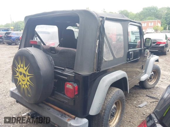 2004 Jeep Wrangler SE with VIN 1J4FA291X4P800973, listed as a IAAI auction lot 42691809 with 116,942 mi miles and . Bid and sale history available at DreamBid. Image 4.