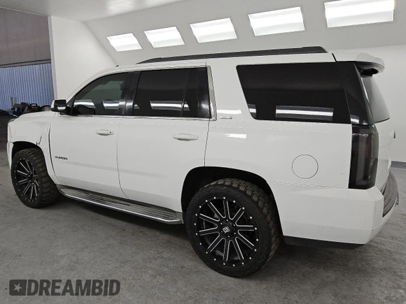 2015 GMC Yukon SLE with VIN 1GKS1AKC3FR170011, listed as a Copart auction lot 45319055 with 229,933 mi miles and Clean Title. Bid and sale history available at carsss.com. Image 2.