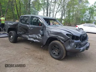 2022 Toyota Tacoma SR with VIN 3TYAX5GN1NT042099, listed as a IAAI auction lot 42081791 with 38,621 mi miles and . Bid and sale history available at DreamBid. Image 1.