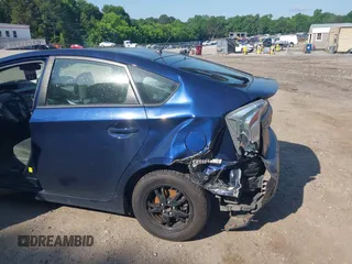 2014 Toyota Prius Four with VIN JTDKN3DU7E0380860, listed as a IAAI auction lot 42308828 with 108,505 mi miles and . Bid and sale history available at DreamBid. Image 6.