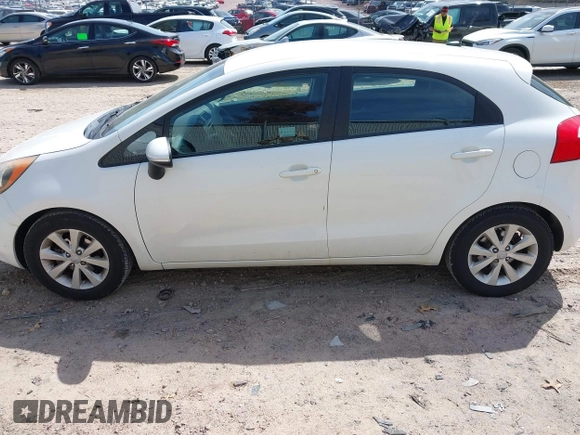 2012 Kia Rio EX with VIN KNADN5A37C6031494, listed as a IAAI auction lot 42052186 with 141,765 mi miles. Bid and sale history available at carsss.com. Image 14.