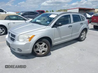 2008 Dodge Caliber SE with VIN 1B3HB28B98D757953, listed as a IAAI auction lot 42111663 with 115,977 mi miles. Bid and sale history available at carsss.com. Image 2.