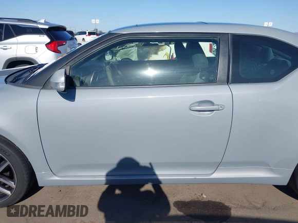 2015 Scion tC with VIN JTKJF5C7XFJ012872, listed as a IAAI auction lot 42128621 with 100,832 mi miles. Bid and sale history available at carsss.com. Image 15.