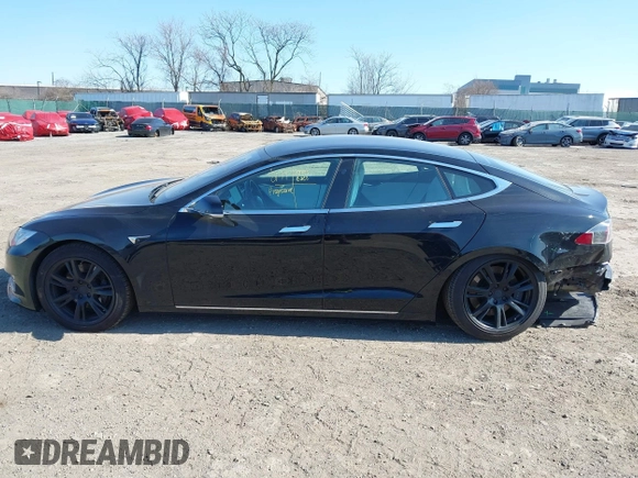 2020 Tesla Model S Long Range with VIN 5YJSA1E23LF381872, listed as a IAAI auction lot 41763046 with 96,720 mi miles and . Bid and sale history available at DreamBid. Image 15.