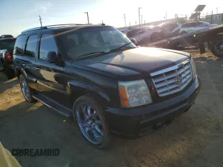 2003 Cadillac Escalade z VIN 1GYEC63TX3R135227, wystawiony jako Copart lot #88373245 z przebiegiem 258 595 mil mil oraz Czysty tytuł • Clean title. Historia ofert i sprzedaży dostępna na DreamBid. Obrazek 4.