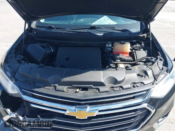 2021 Chevrolet Traverse LT Cloth with VIN 1GNERGKW9MJ162089, listed as a IAAI auction lot 41944248 with 99,586 mi miles. Bid and sale history available at carsss.com. Image 10.