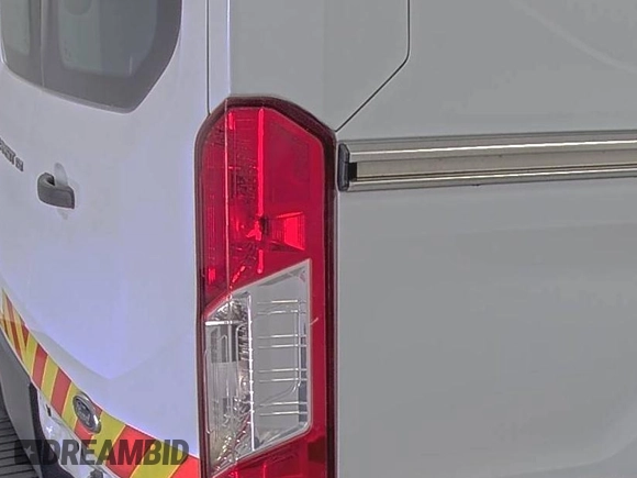 2018 Ford Transit z VIN 1FTYE1YM0JKB52111, wystawiony jako IAAI lot #42789026 z przebiegiem 132 936 mil mil oraz . Historia ofert i sprzedaży dostępna na DreamBid. Obrazek 34.