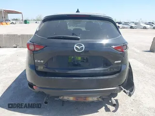 2018 Mazda CX-5 Grand Touring with VIN JM3KFADM8J0330035, listed as a IAAI auction lot 41878680 with 62,632 mi miles. Bid and sale history available at carsss.com. Image 17.