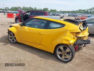 2013 Hyundai Veloster w/Black Int with VIN KMHTC6AD7DU161769, listed as a IAAI auction lot 42448221 with 139,936 mi miles and . Bid and sale history available at DreamBid. Image 3.