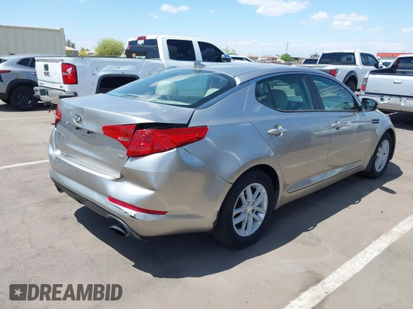 2013 Kia Optima LX with VIN KNAGM4A74D5423255, listed as a IAAI auction lot 42065230 with 116,589 mi miles. Bid and sale history available at carsss.com. Image 4.