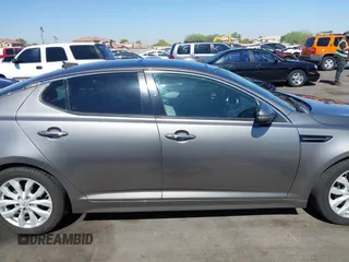 2014 Kia Optima EX z VIN 5XXGN4A72EG339786, wystawiony jako IAAI lot #42328516 z przebiegiem 103 035 mil mil oraz . Historia ofert i sprzedaży dostępna na DreamBid. Obrazek 14.
