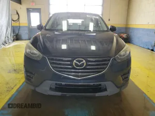 2016 Mazda CX-5 Grand Touring with VIN JM3KE4DY0G0813499, listed as a Copart auction lot 54174805 with 116,709 mi miles and Clean Title. Bid and sale history available at carsss.com. Image 5.