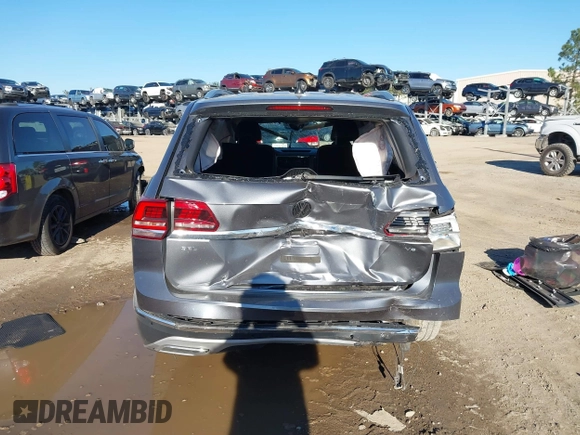 2020 Volkswagen Atlas SEL with VIN 1V2ER2CA0LC505307, listed as a IAAI auction lot 41290000 with 54,537 mi miles and . Bid and sale history available at DreamBid. Image 16.