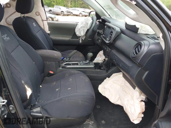 2020 Toyota Tacoma SR with VIN 3TYRX5GN1LT002234, listed as a IAAI auction lot 42082830 with 128,589 mi miles and . Bid and sale history available at DreamBid. Image 5.