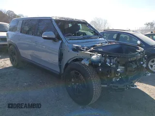 2024 Rivian R1S Adventure with VIN 7PDSGBBA8RN043516, listed as a IAAI auction lot 41675732 with 1 mi miles. Bid and sale history available at carsss.com. Image 1.