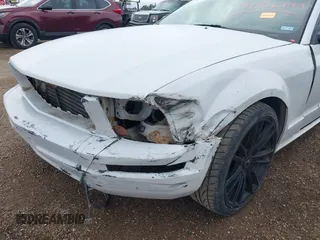 2007 Ford Mustang Deluxe with VIN 1ZVFT84N675266543, listed as a IAAI auction lot 41106799 with 132,127 mi miles and . Bid and sale history available at carsss.com. Image 6.