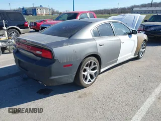 2012 Dodge Charger Police with VIN 2C3CDXAT8CH221109, listed as a IAAI auction lot 41792669 with 188,698 mi miles. Bid and sale history available at carsss.com. Image 4.