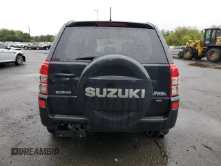 2006 Suzuki Grand Vitara Luxury with VIN JS3TD947364101307, listed as a Copart auction lot 55037585 with 198,616 mi miles and Salvage title. Bid and sale history available at DreamBid. Image 6.