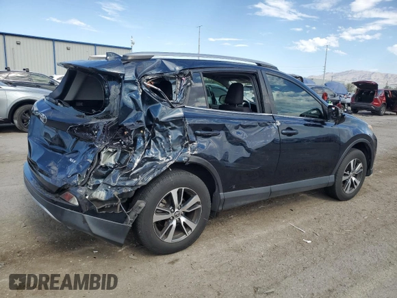 2018 Toyota RAV4 XLE with VIN JTMWFREV7JD130465, listed as a Copart auction lot 63314795 with 97,334 mi miles and Salvage title. Bid and sale history available at DreamBid. Image 3.