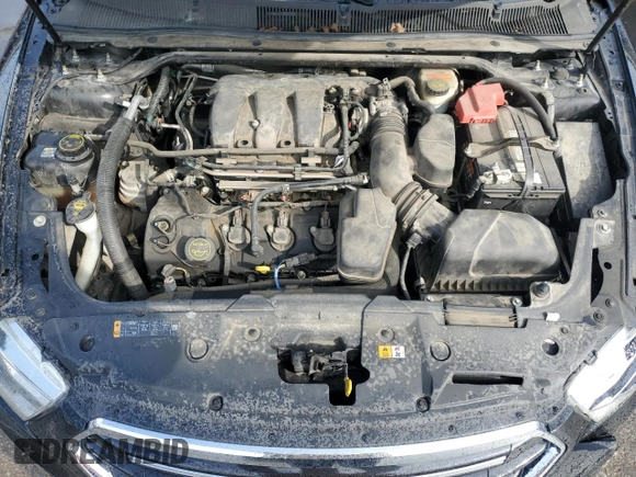 2014 Ford Taurus Limited z VIN 1FAHP2J88EG177883, wystawiony jako Copart lot #56119255 z przebiegiem 141 743 mil mil oraz Szkoda całkowita • Salvage title. Historia ofert i sprzedaży dostępna na DreamBid. Obrazek 11.