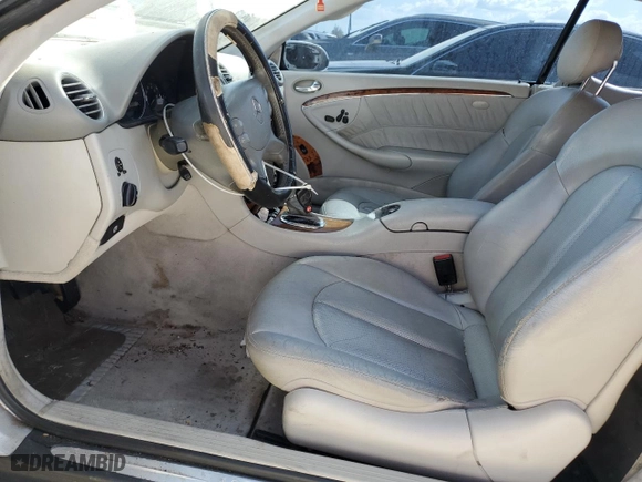 2003 Mercedes-Benz CLK-Class 3.2L with VIN WDBTJ65J63F050559, listed as a Copart auction lot 77650564 with 218,619 mi miles and Clean Title. Bid and sale history available at carsss.com. Image 7.