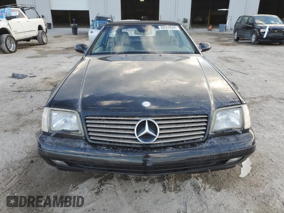 1999 Mercedes-Benz SL-Class with VIN WDBFA68F0XF186163, listed as a Copart auction lot 82669544 with 184,054 mi miles and Salvage Title. Bid and sale history available at carsss.com. Image 5.