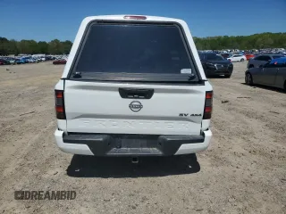 2023 Nissan Frontier SV z VIN 1N6ED1FK1PN665928, wystawiony jako Copart lot #52036625 z przebiegiem 23 760 mil mil oraz Szkoda całkowita • Salvage title. Historia ofert i sprzedaży dostępna na DreamBid. Obrazek 6.