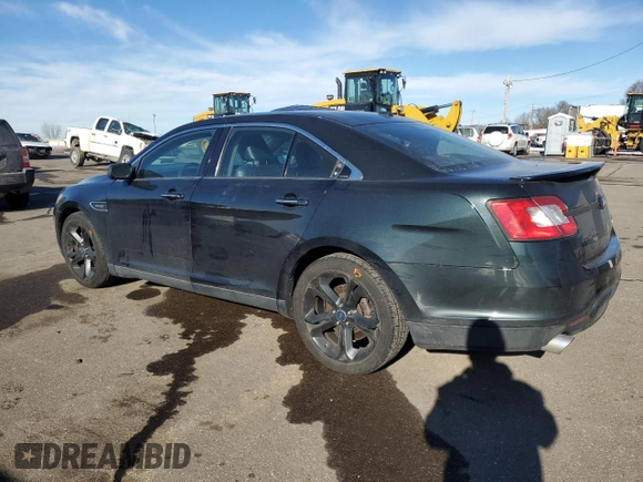 2010 Ford Taurus SHO with VIN 1FAHP2KT6AG153644, listed as a Copart auction lot 42952425 with 124,928 mi miles and Salvage title. Bid and sale history available at DreamBid. Image 2.