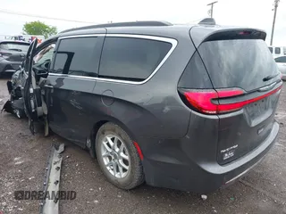 2022 Chrysler Pacifica Touring L with VIN 2C4RC1BG8NR116770, listed as a IAAI auction lot 42093616 with 98,479 mi miles and . Bid and sale history available at DreamBid. Image 3.