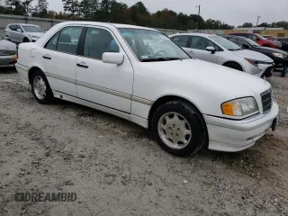 1999 Mercedes-Benz C 230/260/280/320 with VIN WDBHA24G0XA735969, listed as a Copart auction lot 79659264 with 291,245 mi miles and Salvage Title. Bid and sale history available at carsss.com. Image 4.