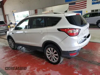 2018 Ford Escape Titanium с VIN 1FMCU9J90JUB30658, выставлен на аукционе Copart как лот 64001665 с пробегом 61 970 миль миль и Списание • Salvage title. История ставок и продаж доступна на DreamBid. Изображение 2.