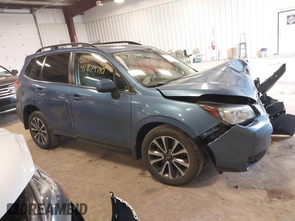2018 Subaru Forester Premium with VIN JF2SJGECXJH606668, listed as a IAAI auction lot 41879710 with 64,910 mi miles. Bid and sale history available at carsss.com. Image 13.