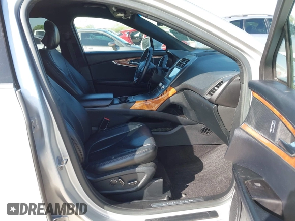 2016 Lincoln MKX Select with VIN 2LMTJ6KRXGBL76495, listed as a IAAI auction lot 41990549 with 139,525 mi miles and . Bid and sale history available at DreamBid. Image 5.