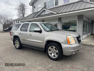 2007 GMC Yukon SLT z VIN 1GKFK13087J116934, wystawiony jako Copart lot #56947105 z przebiegiem 265 897 mil mil oraz Czysty tytuł • Clean title. Historia ofert i sprzedaży dostępna na DreamBid. Obrazek 1.