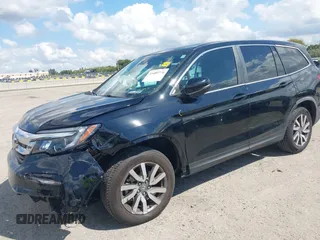 2020 Honda Pilot EX-L with VIN 5FNYF5H59LB014225, listed as a IAAI auction lot 41689776 with 90,994 mi miles. Bid and sale history available at carsss.com. Image 18.