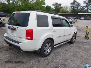 2011 Honda Pilot Touring z VIN 5FNYF4H9XBB053966, wystawiony jako IAAI lot #42148528 z przebiegiem 191 939 mil mil oraz . Historia ofert i sprzedaży dostępna na DreamBid. Obrazek 4.