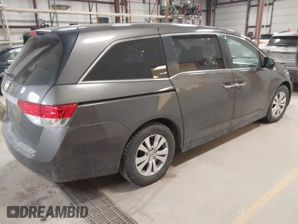 2015 Honda Odyssey EX-L with VIN 5FNRL5H64FB055890, listed as a IAAI auction lot 41706141 with 155,167 mi miles and . Bid and sale history available at carsss.com. Image 4.