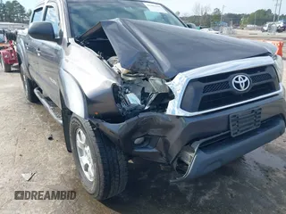 2015 Toyota Tacoma PreRunner z VIN 5TFJX4GN9FX039498, wystawiony jako IAAI lot #41487344 z przebiegiem 135 061 mil mil oraz . Historia ofert i sprzedaży dostępna na DreamBid. Obrazek 6.