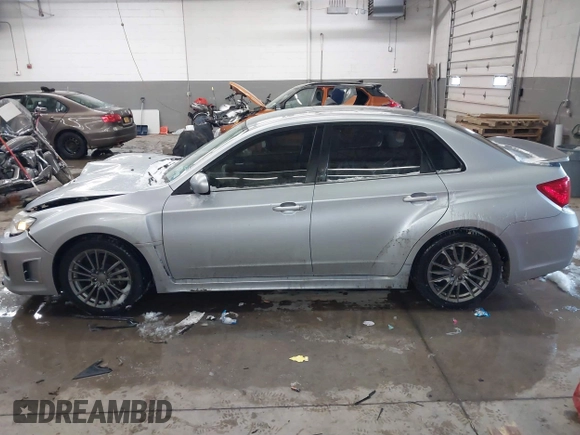 2012 Subaru WRX WRX z VIN JF1GV7E65CG023040, wystawiony jako IAAI lot #41622053 z przebiegiem 110 718 mil mil oraz . Historia ofert i sprzedaży dostępna na DreamBid. Obrazek 14.